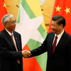  Tổng thống Myanmar U Htin Kyaw (trái) và Chủ tịch Trung Quốc Tập Cận Bình. (Nguồn: AFP/TTXVN)