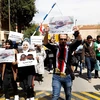  Người dân thủ đô Damascus biểu tình phản đối vụ tấn công bằng tên lửa của Mỹ. (Nguồn: EPA/TTXVN)