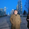 Nhà lãnh đạo Triều Tiên Kim Jong-un (giữa) thăm một công trường xây dựng ở thủ đô Bình Nhưỡng ngày 16/3. (Nguồn: YONHAP/TTXVN)
