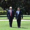  Tổng thống Mỹ Donald Trump (trái) và Chủ tịch Trung Quốc Tập Cận Bình tại cuộc gặp ở West Palm Beach, bang Florida, Mỹ ngày 7/4. (Nguồn: THX/TTXVN)