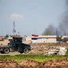  Khói bốc lên sau các cuộc giao tranh giữa quân đội Chính phủ và các tay súng IS tại Mosul ngày 4/4. (Nguồn: AFP/TTXVN)