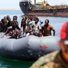 Người di cư được lực lượng bảo vệ bờ biển Libya cứu ngày 6/5. (Nguồn: AFP/TTXVN)