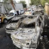 Hiện trường một vụ nổ bom ở Baghdad ngày 29/4. (Nguồn: EPA/TTXVN)
