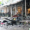 Cảnh sát điều tra tại hiện trường vụ đánh bom tại siêu thị Big C ở Pattani, miền Nam Thái Lan. (Nguồn: EPA/TTXVN)