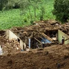  Hiện trường vụ lở đất ở San Pedro Soloma ngày 20/6. (Nguồn: AFP/TTXVN)