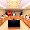Phó Thủ tướng Chính phủ Vương Đình Huệ chủ trì Phiên họp. (Ảnh: Nguyễn Dân/TTXVN)