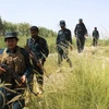 Lực lượng an ninh Afghanistan trong chiến dịch chống phiến quân tại quận Nawa, tỉnh Helmald ngày 9/7. (Nguồn: THX/TTXVN)