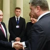 Tổng thống Nga Putin và Tổng thống Ukraine Poroshenko.. (Nguồn: Sputnik)