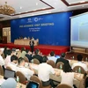 Ban tổ chức giới thiệu về các hoạt động chuẩn bị cho Tuần lễ cấp cao APEC 2017 tại Đà Nẵng với đại biểu các nền kinh tế. (Ảnh: Trần Lê Lâm/TTXVN)