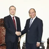 Thủ tướng Nguyễn Xuân Phúc tiếp ông Michiaki Hirose, Tổng Giám đốc Công ty Tokyo Gas. (Ảnh: Thống Nhất/TTXVN)