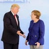  Tổng thống Mỹ Donald Trump (trái) và Thủ tướng Đức Angela Merkel. (Nguồn: AFP/TTXVN)
