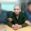 Nguyễn Văn Tình bị bắt giữ. (Nguồn: TTXVN)