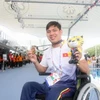  Vận động viên Võ Thanh Tùng, huy chương vàng bơi 200 mét tự do. (Nguồn: TTXVN)