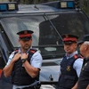  Cảnh sát gác tại Barcelona, Tây Ban Nha ngày 25/9. (Nguồn: EFP/TTXVN)
