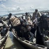Người tị nạn Hồi giáo Rohingya tới lánh nạn trại tị nạn ở Teknaf, Bangladesh ngày 3/10. (Nguồn: AFP/TTXVN)
