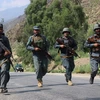 Lực lượng an ninh Afghanistan trong chiến dịch chống IS tại khu vực Wata Pur, tỉnh Kunar ngày 25/9. (Nguồn: THX/TTXVN)