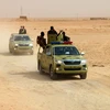  Các lực lượng Iraq trong chiến dịch chống IS tại làng Anna, tỉnh Anbar ngày 20/9. (Nguồn: AFP/TTXVN)