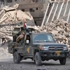Các lực lượng ủng hộ Chính phủ Syria trong chiến dịch truy quét IS tại Deir Ezzor ngày 4/11. (Nguồn: AFP/TTXVN)