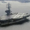 Tàu sân bay USS Ronald Reagan rời căn cứ hải quân Yokosuka gần Tokyo (Nhật Bản) ngày 8/10. (Nguồn: Kyodo/TTXVN)