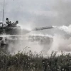Xe tăng T-90 của Nga tham gia diễn tập tại khu vực ngoại ô Moskva ngày 22/8. (Nguồn: AFP/TTXVN)