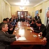 Bộ trưởng Bộ Xây dựng Phạm Hồng Hà phát biểu tại buổi thăm và làm việc với Đại sứ quán Việt Nam tại Algeria. (Ảnh: Tấn Đạt/TTXVN)