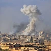 Khói bốc lên sau một cuộc không kích nhằm vào các vị trí của IS tại Deir Ezzor, Syria ngày 31/10. (Nguồn: AFP/TTXVN)
