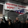 Người dân biểu tình phản đối cải cách tại Athens, Hy Lạp ngày 11/1. (Nguồn: AFP/TTXVN)