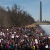 Người dân Mỹ tuần hành phản đối Tổng thống Mỹ Donald Trump nhân một năm cầm quyền của ông ở Washington, DC ngày 20/1. (Nguồn: UPI/YONHAP/TTXVN)