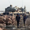 Binh sĩ và xe quân sự Thổ Nhĩ Kỳ tại Afrin, Syria ngày 22/1. (Nguồn: THX/TTXVN)