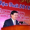 Thủ tướng nước CHDCND Lào Thongloun Sisoulith phát biểu. (Ảnh: Thống Nhất/TTXVN)