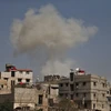 Khói bốc lên sau các cuộc giao tranh ở Đông Ghouta, Syria ngày 6/3. (Nguồn: AFP/TTXVN)