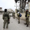 Quân nổi dậy tại Syria do Thổ Nhĩ Kỳ hậu thuẫn tuần tra tại thị trấn Jandairis, khu vực Afrin, Syria ngày 9/3. (Nguồn: AFP/TTXVN)