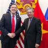  Đại sứ Việt Nam tại Hoa Kỳ Phạm Quang Vinh đã tiếp Phó Chủ tịch Hội Chữ thập đỏ Hoa Kỳ Jono Anzalone. (Ảnh: Đoàn Hùng/TTXVN)