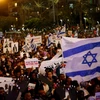 Biểu tình phản đối kế hoạch trục xuất người di cư châu Phi khỏi Tel Aviv, Israel ngày 24/3. (Nguồn: Reuters)