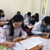  Ngân Hà cùng các bạn trong giờ học. (Ảnh: Khiếu Tư/TTXVN)