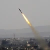 Tên lửa được phóng bởi quân đội Syria ở Đông Ghouta ngày 7/4. (Nguồn: THX/TTXVN)