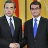  Ngoại trưởng Nhật Bản Taro Kono trong cuộc gặp với người đồng cấp Trung Quốc Vương Nghị. (Nguồn: Kyodo/TTXVN) 