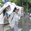 [Photo] Không khí lạnh gây mưa, nhiệt độ tại Hà Nội giảm mạnh