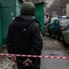 Cảnh sát Nga phong tỏa hiện trường vụ nổ súng ở Nhà máy bánh kẹo Menshevik. (Nguồn: THX/TTXVN)