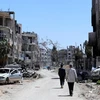 Cảnh đổ nát tại thị trấn Douma, Đông Ghouta, Syria ngày 16/4. (Nguồn: EPA/TTXVN)