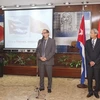 (Đại sứ Việt Nam Đặng Xuân Dũng (phải) và Đại sứ Cuba Orestes Perez Perez phát biểu tại buổi gặp. (Ảnh: Hoài Nam/TTXVN)