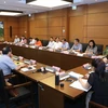 Đoàn đại biểu Quốc hội các tỉnh Bắc Ninh, Tuyên Quang, Ninh Thuận và Long An thảo luận ở tổ. (Ảnh: Doãn Tấn/TTXVN)