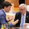 hủ tướng Canada Justin Trudeau (ảnh, trái) Chủ tịch Ủyban châu Âu Jean-Claude Juncker (ảnh, phải) (Nguồn: AFP/TTXVN) 