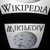 Biểu tượng Wikipedia trên màn hình máy tính bảng ở Paris, Pháp. (Nguồn: AFP/TTXVN)