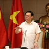 Phó Thủ tướng Vương Đình Huệ điều hành cuộc họp. (Ảnh: Dương Giang/TTXVN)