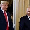 Tổng thống Nga Vladimir Putin (phải) và Tổng thống Mỹ Donald Trump tại cuộc gặp thượng đỉnh ở Helsinki, Phần Lan ngày 16/7. (Ảnh: AFP/TTXVN)