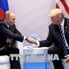  Tổng thống Nga Vladimir Putin (trái) và người đồng cấp Mỹ Donald Trump. (Nguồn: AFP/TTXVN)