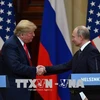 Tổng thống Mỹ Donald Trump (trái) và Tổng thống Nga Vladimir Putin trong cuộc họp báo chung kết thúc Hội nghị thượng đỉnh ở Helsinki, Phần Lan ngày 16/7. (Nguồn: AFP/ TTXVN) 