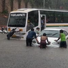 Cảnh ngập lụt tại New Delhi, Ấn Độ ngày 16/7. (Ảnh: AFP/TTXVN)