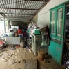  Lũ bùn, đất, đá tràn đầy vào nhà dân ở bản Chu Va, xã Sơn Bình, huyện Tam Đường (tỉnh Lai Châu). (Ảnh: Quý Trung/TTXVN)